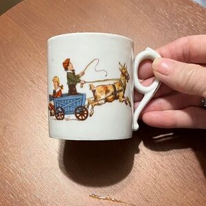 Charming Illustrated White Mug with Blue Cart Design